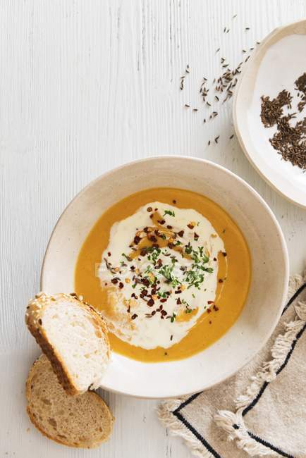 Pea soup with caraway and sour cream — Stock Photo