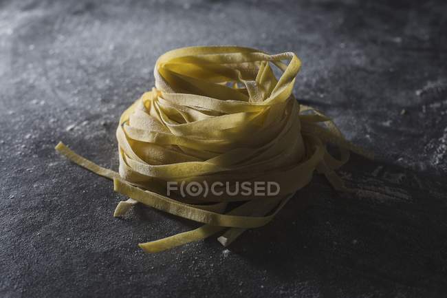 Homemade tagliatelle pasta nest — Stock Photo