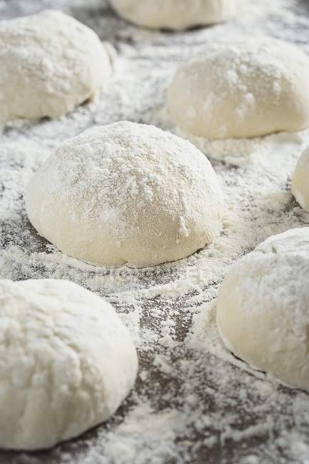 Balls of pizza dough — Stock Photo