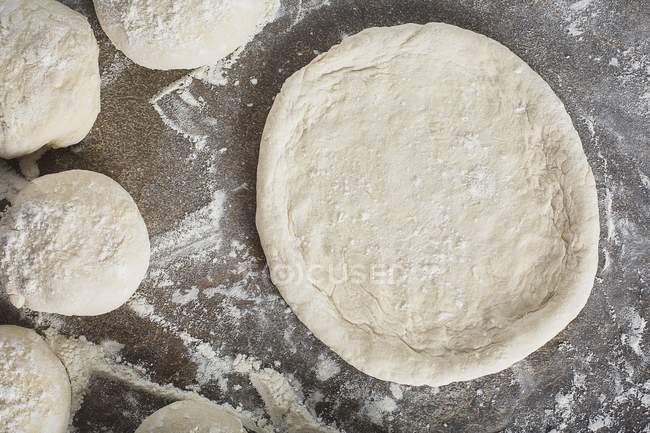 Boards of pizza dough — Stock Photo