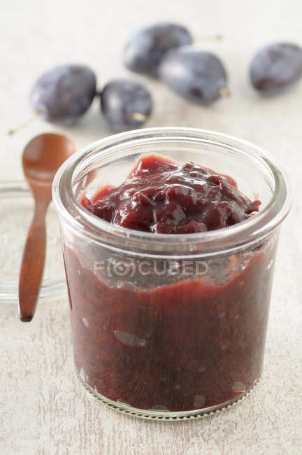 Jar of damson jam — Stock Photo
