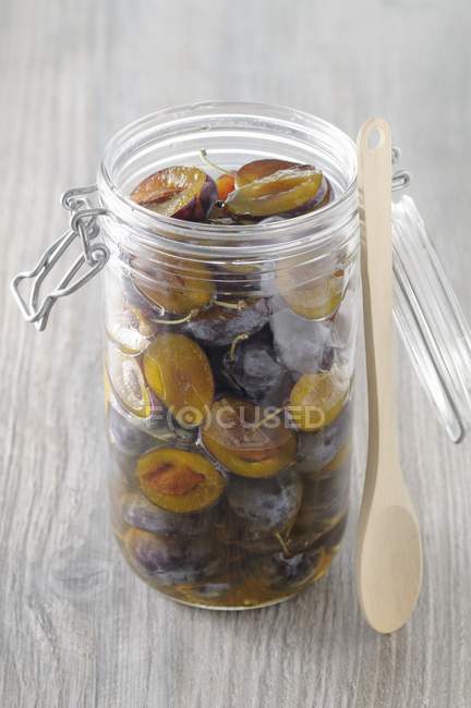 Sweet-and-sour preserved damsons — Stock Photo