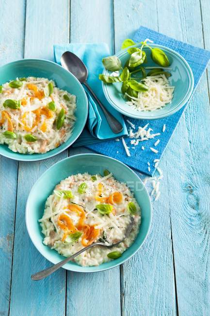 Basil risotto rice with smoked salmon — Stock Photo