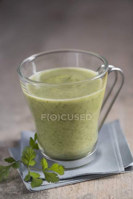 Mexican coriander soup in glass cup — Stock Photo