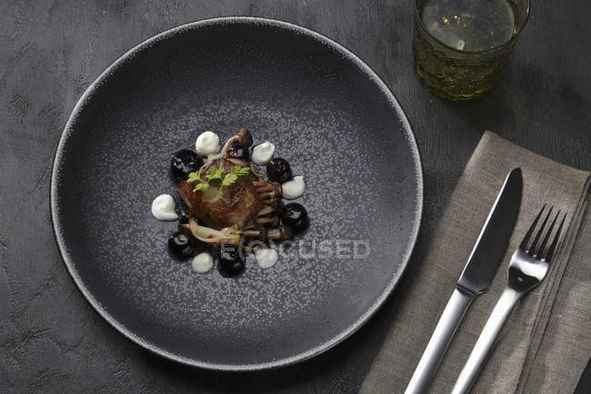 Duck liver with blueberries — Stock Photo