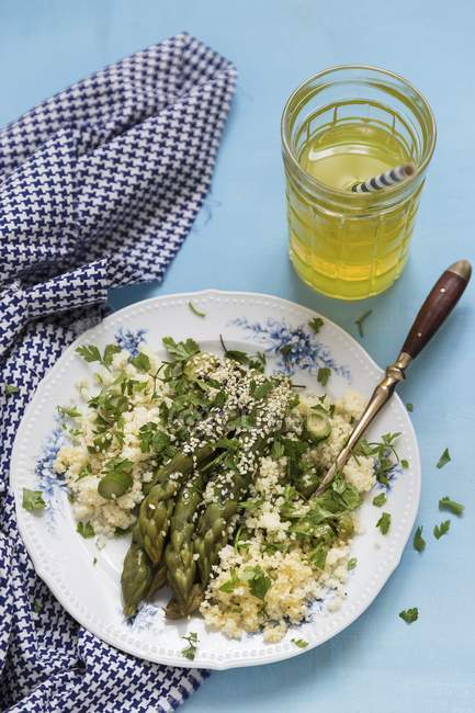 Green asparagus millet risotto — Stock Photo