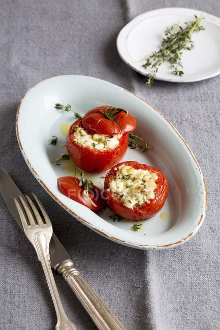 Tomatoes stuffed with feta — Stock Photo