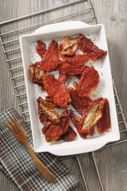 Dried tomatoes with salt — Stock Photo