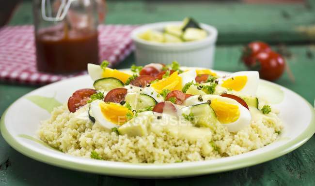 Egg ragout on bed of couscous — Stock Photo