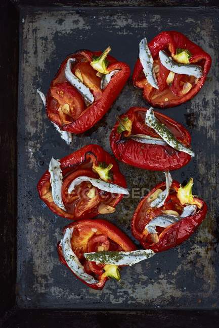 Piedmont-style stuffed peppers on black surface — Stock Photo