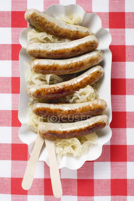 Grilled Sausages with sauerkraut — Stock Photo