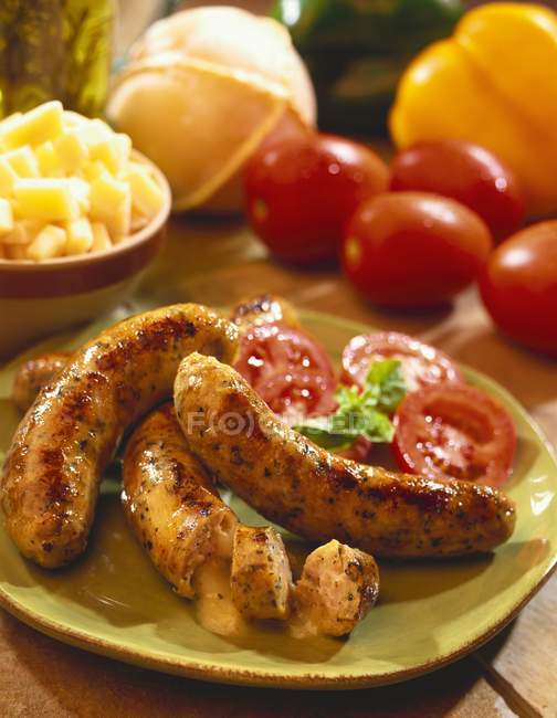 Cheese-stuffed sausages — Stock Photo