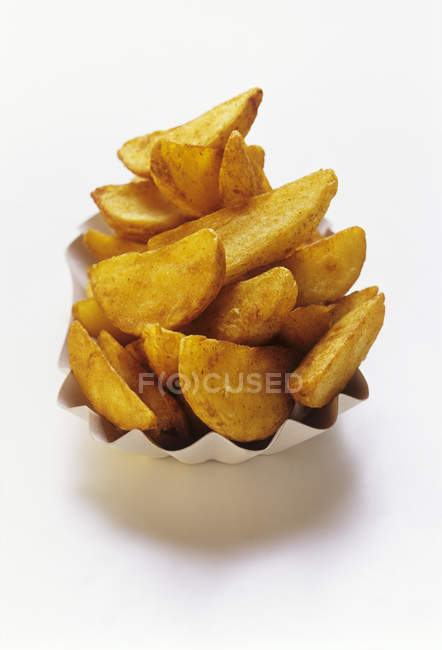 Porción de papas fritas - foto de stock