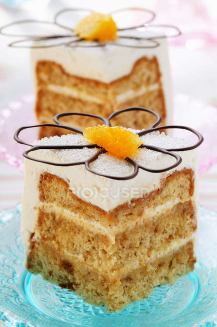Square of cake with cream — Stock Photo