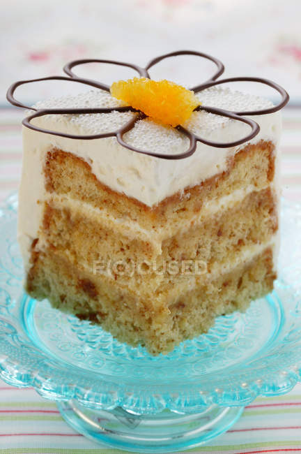 Square of cake with cream — Stock Photo