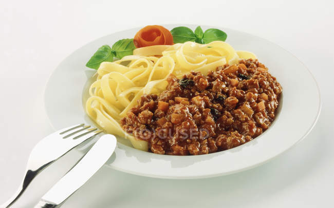 Mince ragout with ribbon tagliatelle pasta — Stock Photo