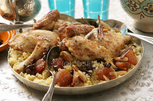 Couscous with chicken and dried fruit — Stock Photo