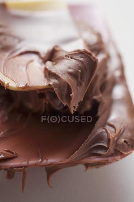 Cuillère à mélanger avec du chocolat — Photo de stock