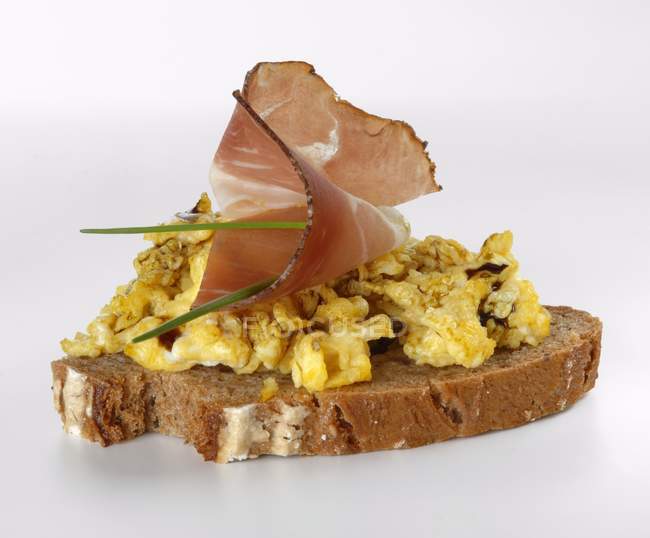 Scrambled egg with seed — Stock Photo