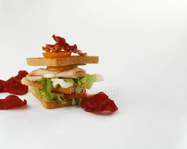 Club sandwich and chips — Stock Photo