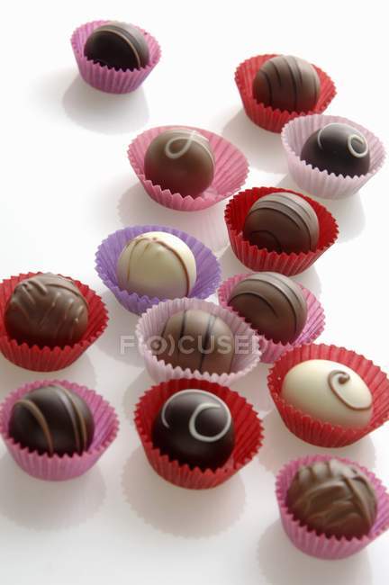 Chocolates in paper cases — Stock Photo