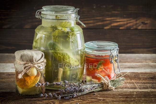 Pickled cucumbers in jars — Stock Photo