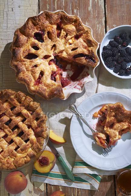 Peach and berry pies — Stock Photo