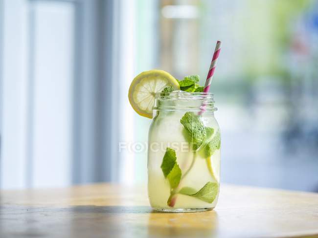 Homemade lemonade in jar with straw — Stock Photo