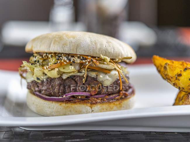 Duck burger with sesame seeds — Stock Photo