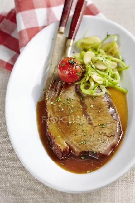 Braised beef with parsnip and celery medley — Stock Photo