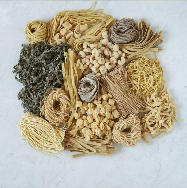 Différents types de pâtes — Photo de stock