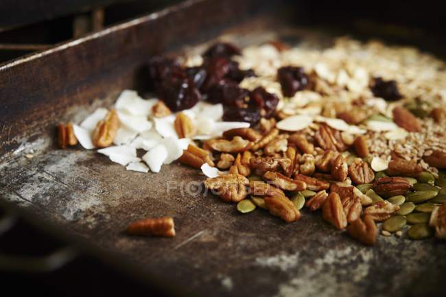 Muesli with nuts, fruit and grains — Stock Photo