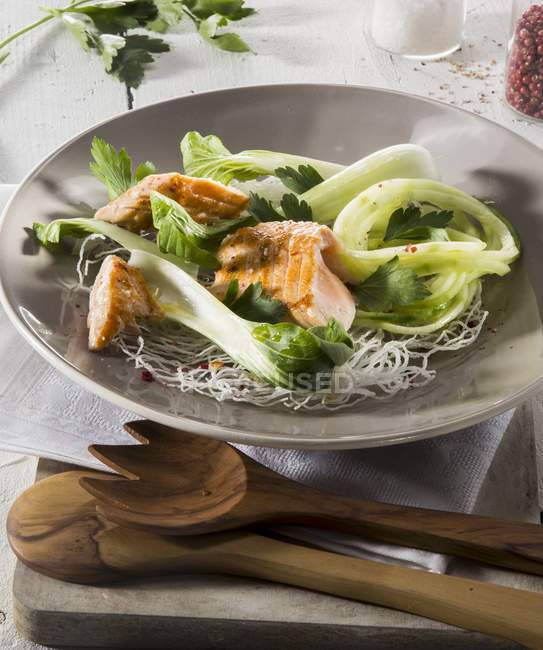 Salmon and bok choy with glass noodles — Stock Photo