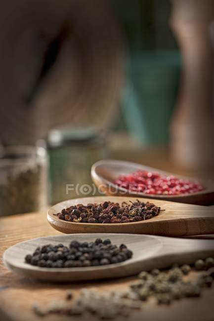 Various types of peppercorns — Stock Photo
