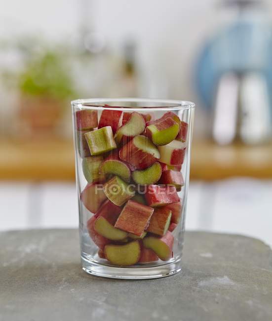 Glass of sliced rhubarb — Stock Photo