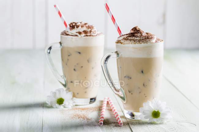 Side view of iced coffee with whipped cream — Stock Photo