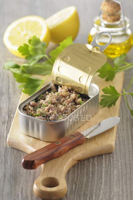 Closeup view of an open tin of fish Rillette — Stock Photo