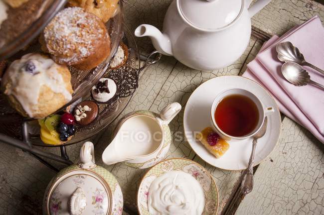 Afternoon tea with cakes — Stock Photo