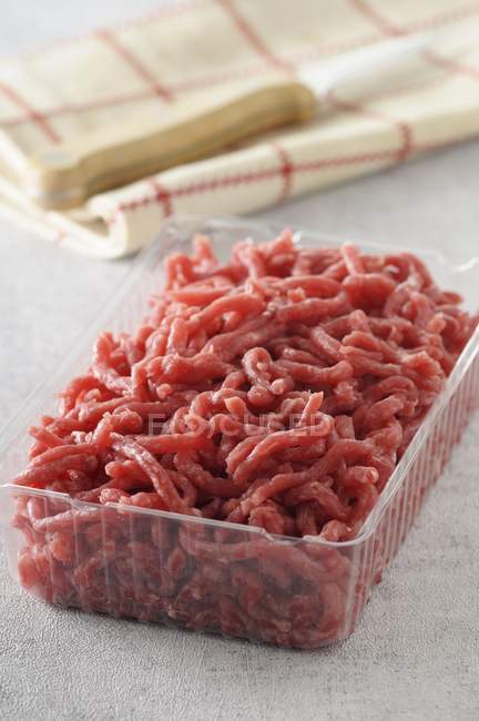 Mince in plastic container — Stock Photo