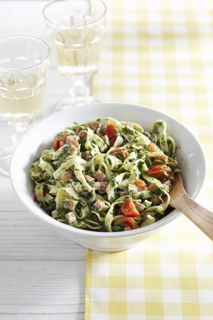 Tagliatelle with fresh pesto — Stock Photo