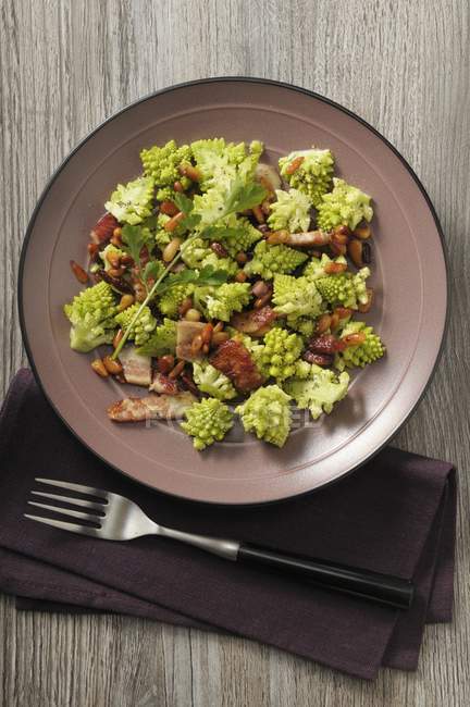 Romanesco broccoli with bacon — Stock Photo