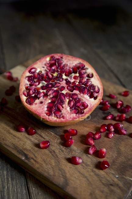 Half of fresh pomegranate — Stock Photo