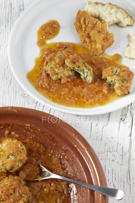 Closeup elevated view of Tagine with fish nuggets — Stock Photo