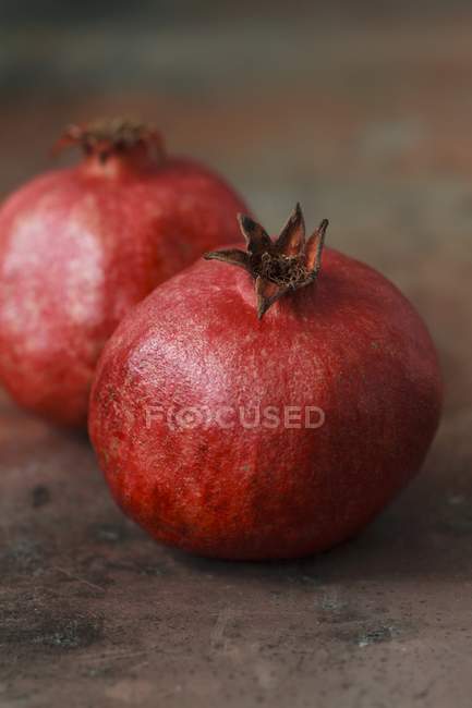 Fresh red pomegranates — Stock Photo