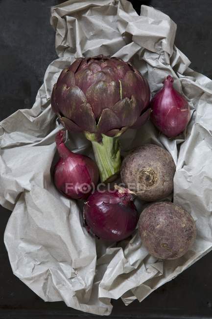 Vegetables on piece of paper — Stock Photo