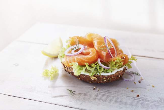 Roll with smoked salmon — Stock Photo