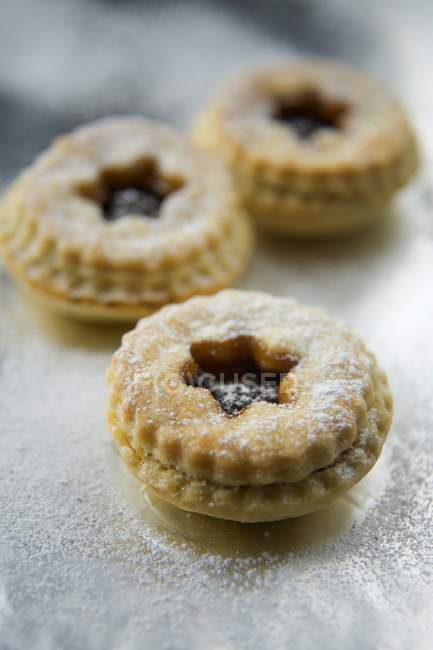 Mince pies on silver surface — Stock Photo