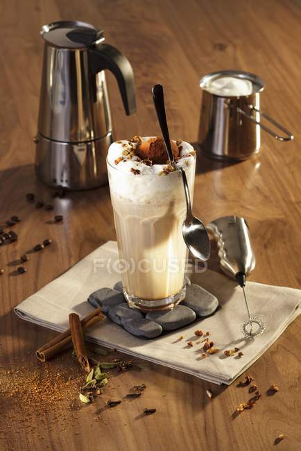 Elevated view of iced coffee with spices — Stock Photo