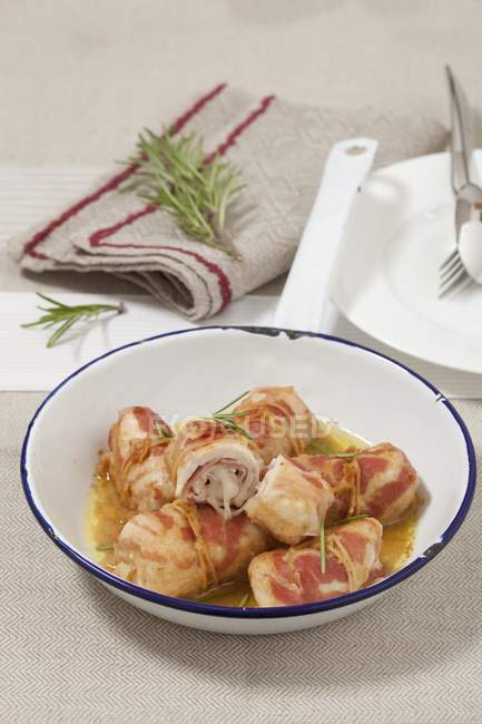Elevated view of Fagottini di pollo with rosemary and bacon — Stock Photo