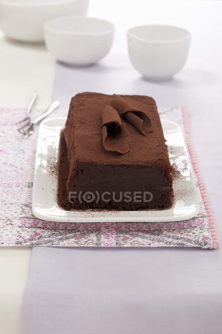 Closeup view of Mattonella al cioccolato Italian chocolate cake on plate — Stock Photo